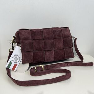 Woven suede handbag by Viola Castellani